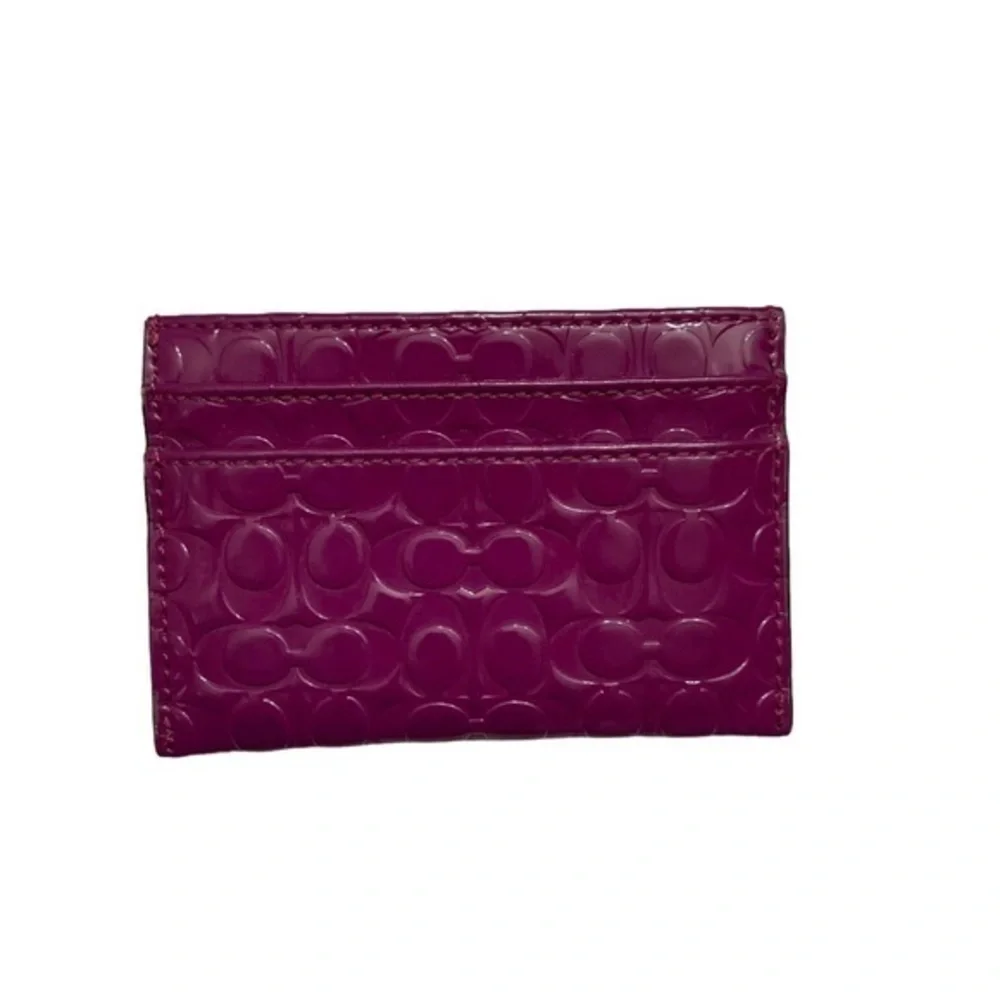 Coach purple patent leather embossed signature c card holder